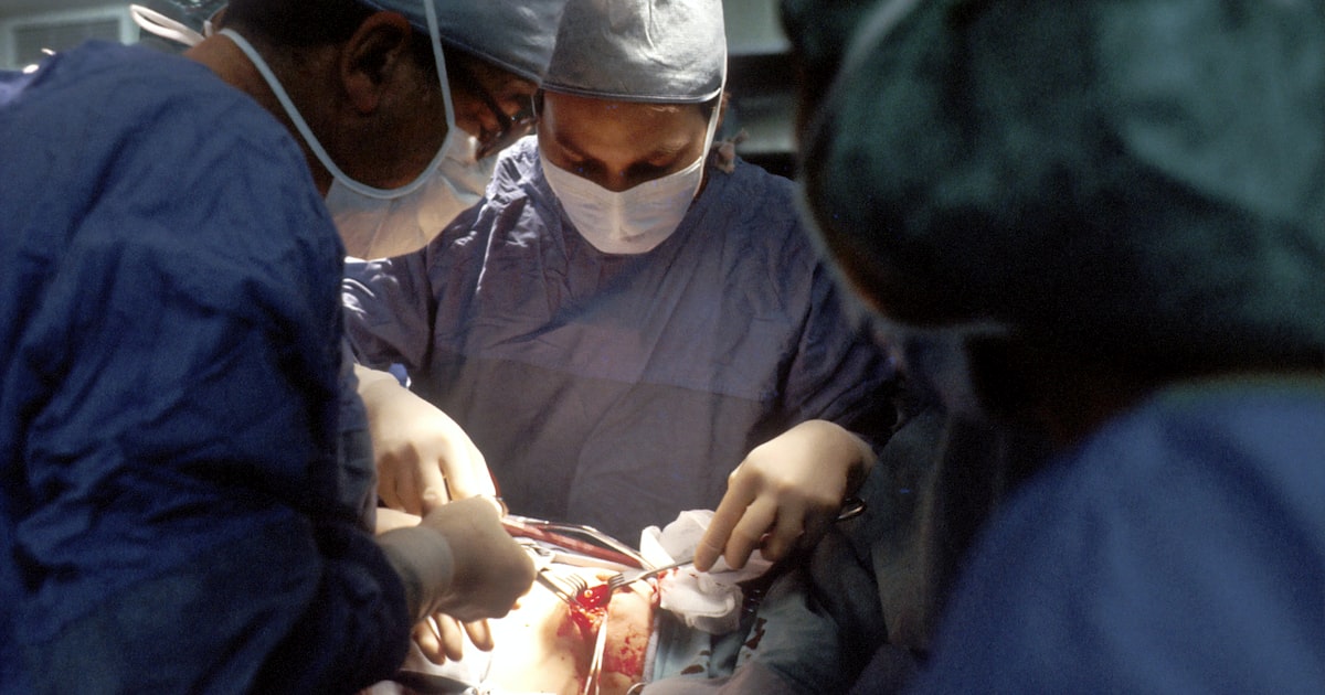 Doctor reviewing imaging on a screen with AI-augmented overlay