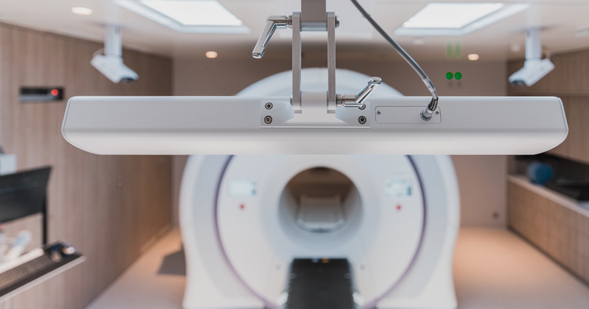 Doctor examining brain imaging during a TBI evaluation in Ohio