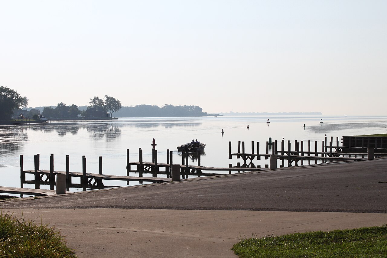 Motorboats and personal watercraft on a busy summer lake
