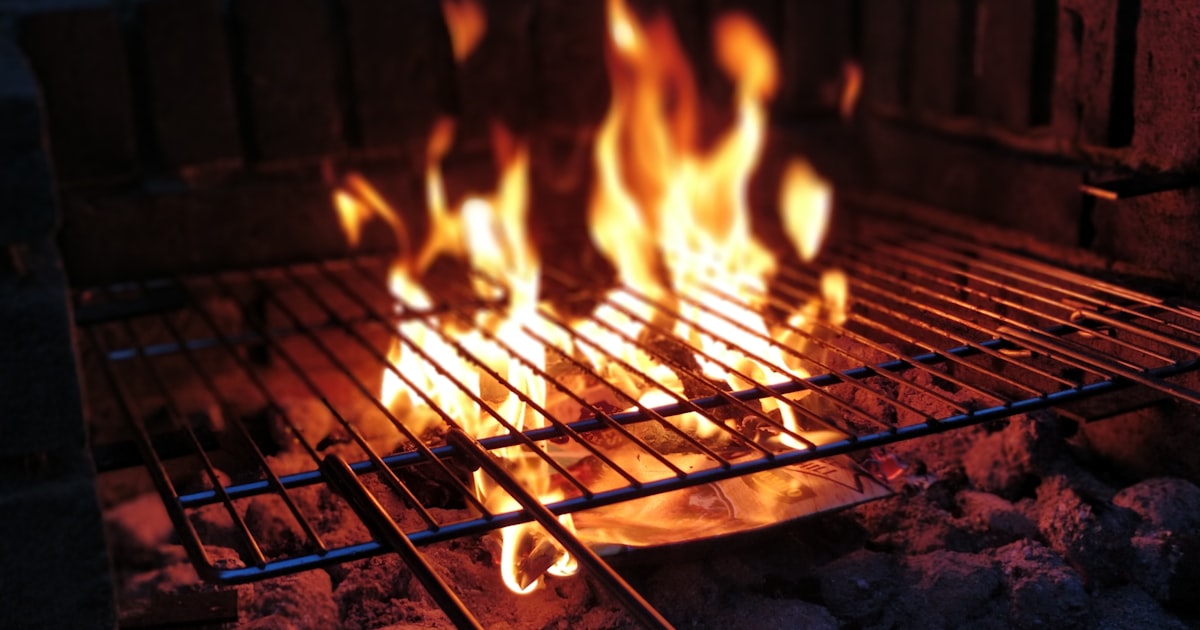 Close view of open flames from a gas burner, a common source of Ohio burn injuries