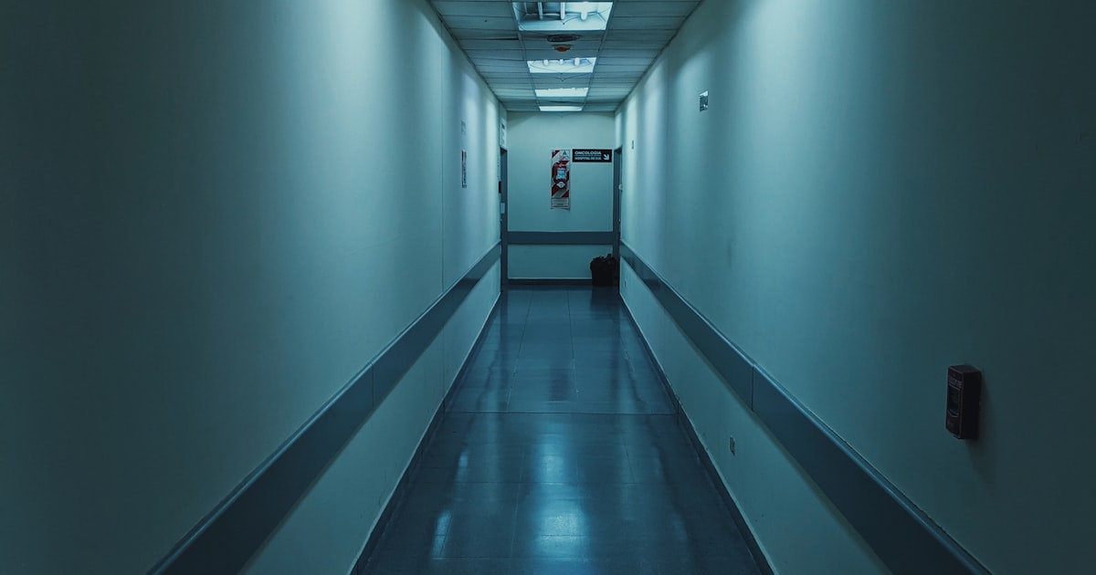 A patient reviewing medical records at home while considering an Ohio malpractice claim