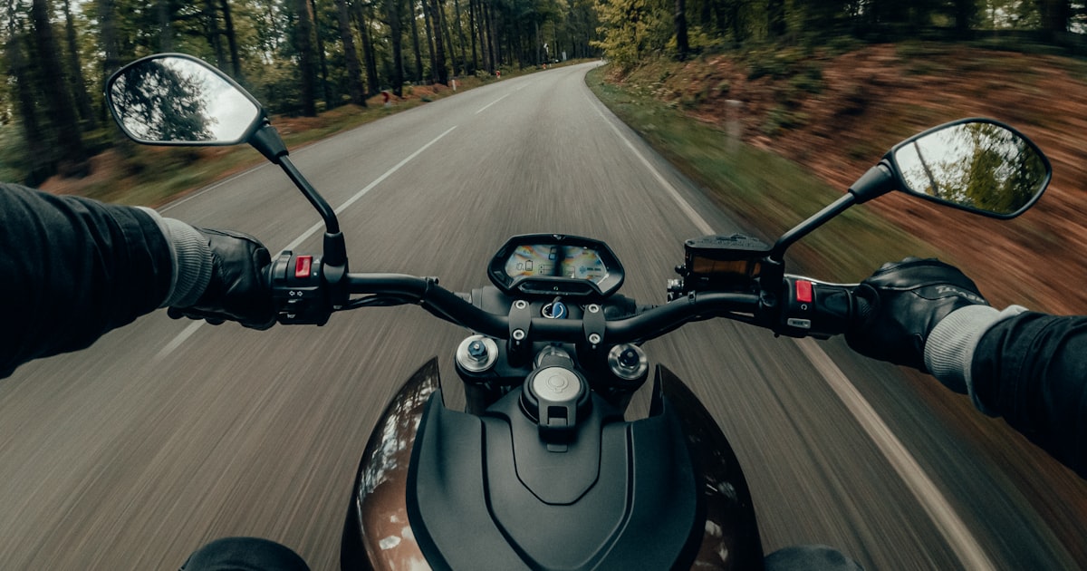 Close view of a parked motorcycle and helmet, illustrating rider safety gear in Ohio