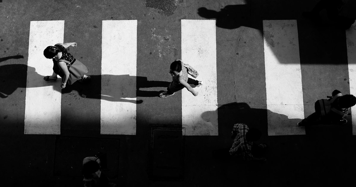 Marked crosswalk and pedestrian signal on a Cleveland city street