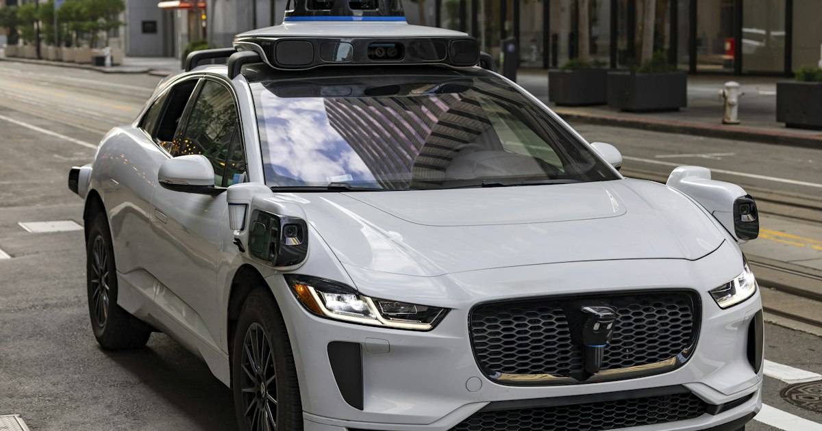 Sensors and cameras on an autonomous vehicle scanning the road and nearby traffic