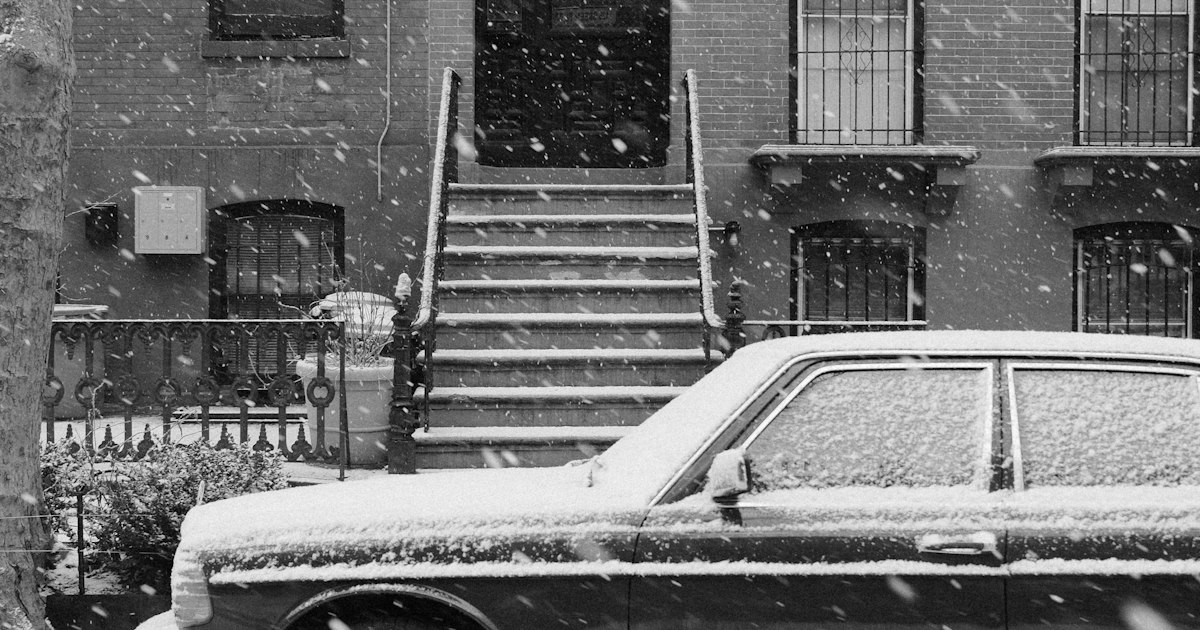 Snow covered steps leading to a building entrance in Northeast Ohio